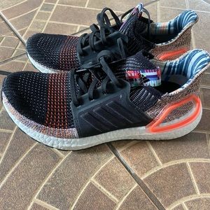 slightly worn black and multicolor adidas ultra boost